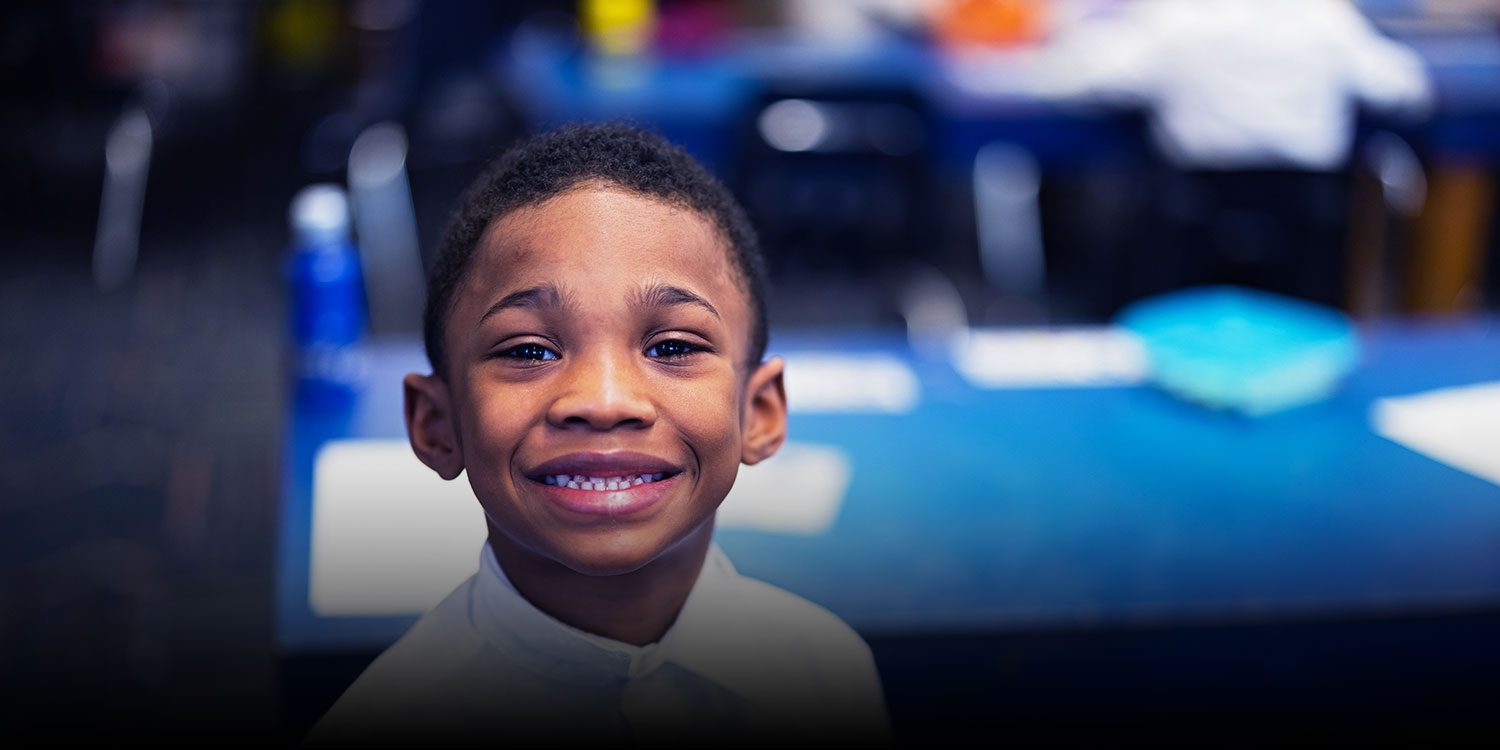 Smiling student in the classroom